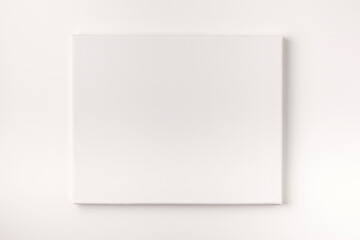 Empty painting canvas isolated on white background.
