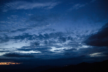 Aerial night view of Chiang Mai Cityscape from a high angle with Doi Suthep at dusk in Chiang Mai,...