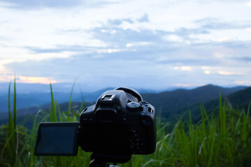 The camera stands on the sky background, waiting for the middle to shoot the stars at night.