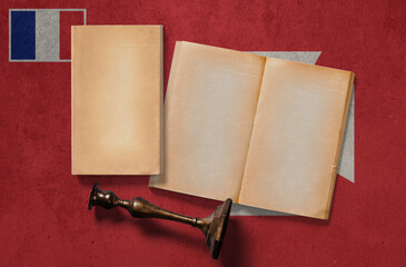 Wallis And Futuna vintage historical concept. Retro craft papers and old wooden candlestick on...