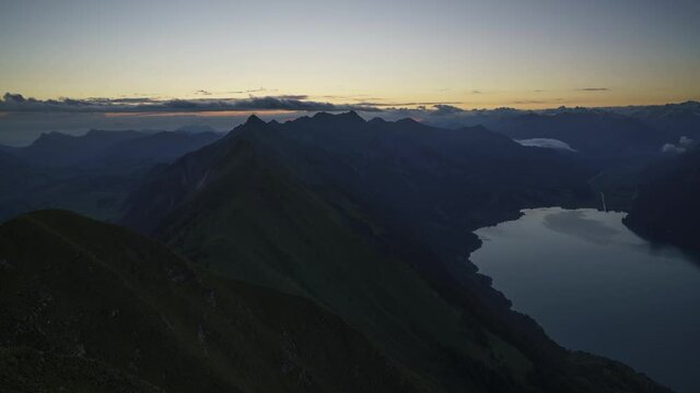 The beautiful summer sunrise over the mountains of Augstmatthorn, Switzerland - time lapse