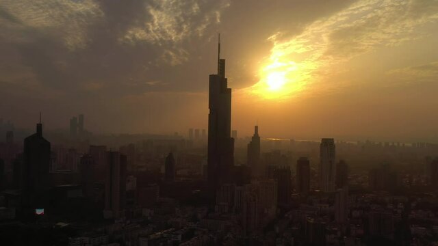 sunset time flight over nanjing famous downtown cityscape aerial panorama 4k china