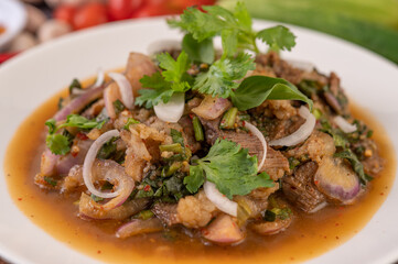 Spicy minced pork in a white plate.