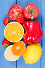 Fruits and vegetables containing vitamin C and natural minerals, healthy nutrition concept