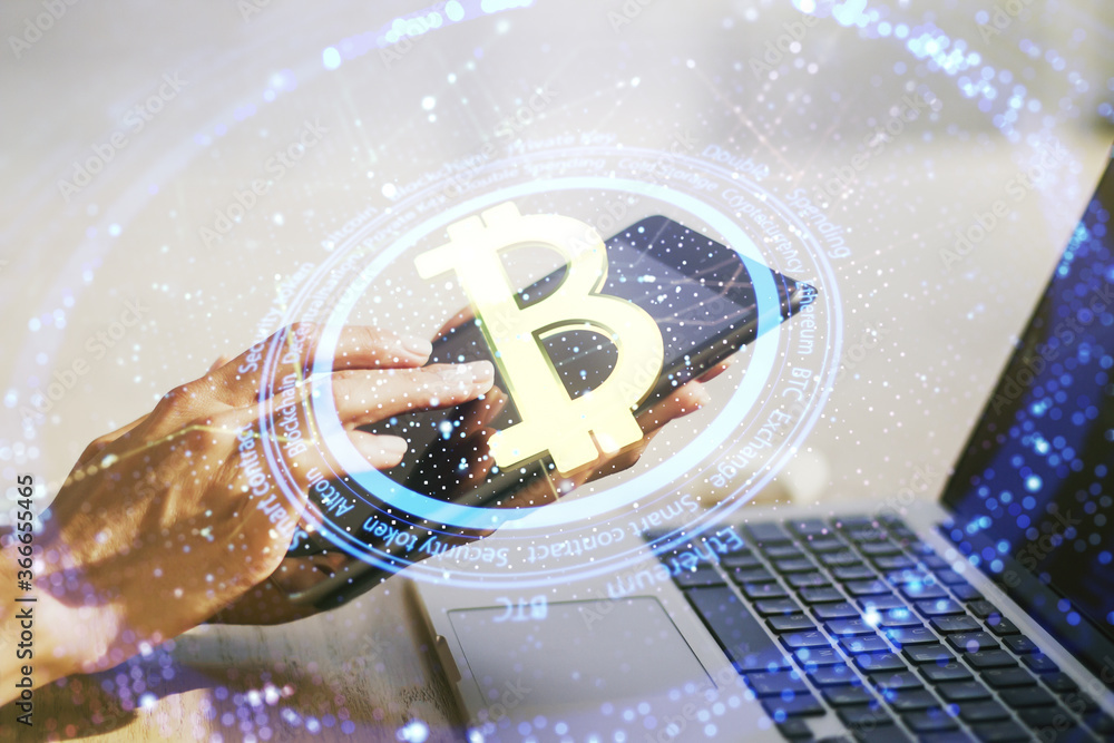Poster double exposure of creative bitcoin symbol hologram and hand working with a digital tablet on backgr