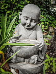 statue of buddha in the garden