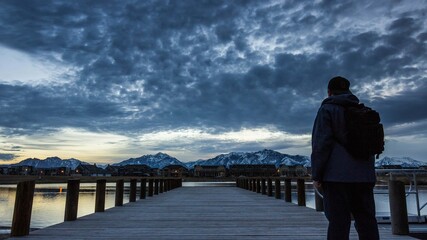man walking on the pier