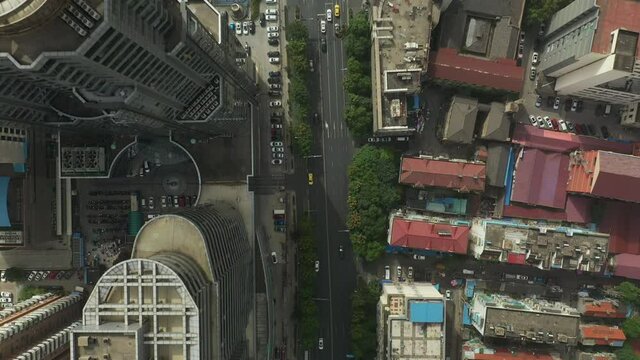 sunny day smog nanjing city downtown traffic street aerial topdown panorama 4k china