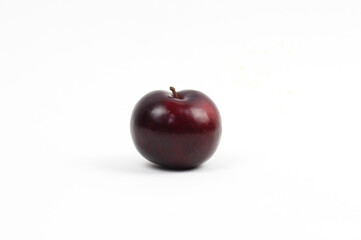 plums on white background