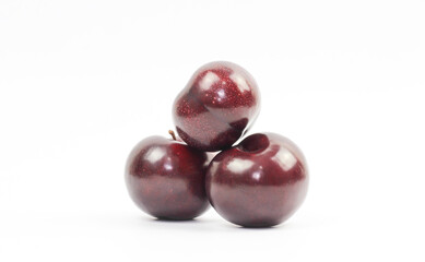 plums on white background