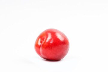 plums on white background