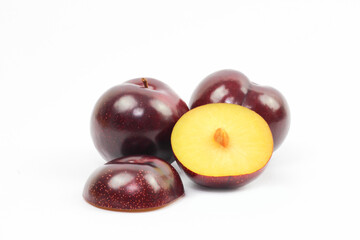 plums on white background