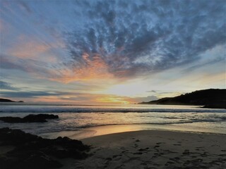 Fototapeta na wymiar Sunset over the beach