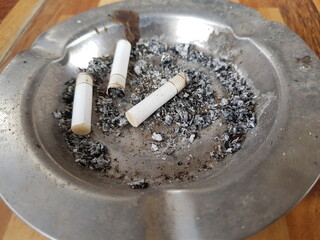 Ashtray With Ashes and Cigarettes