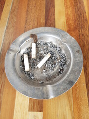 Ashtray With Ashes and Cigarettes