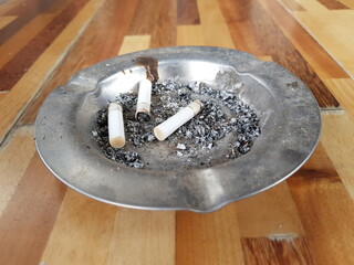 Ashtray With Ashes and Cigarettes