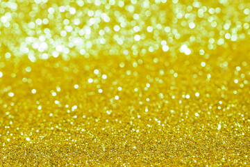 sparkles of golden glitter texture background
