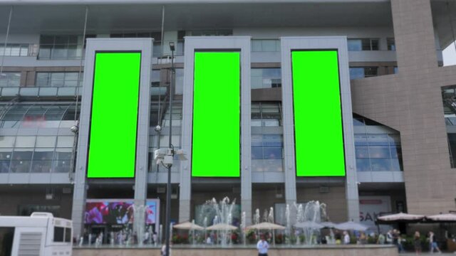 Three Vertical Large Billboard with a Green Screen for Advertising on the Modern Mall 