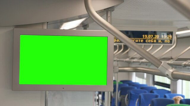 Metro Train with Green Screen Information Monitor to Include Posters or Advertising