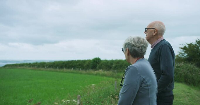 Mature couple standing in the countryside