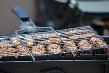 Fried meat patties for a hamburger.