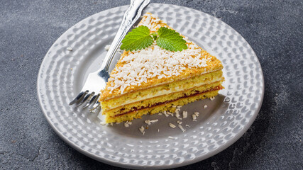 Sponge cake with jam and buttercream and mint