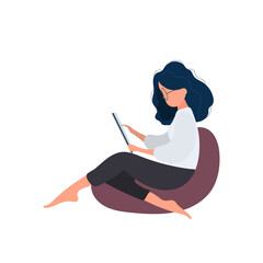 The girl is sitting on an ottoman with a tablet. A woman with a tablet is sitting on a large pouf. Isolated. Vector.