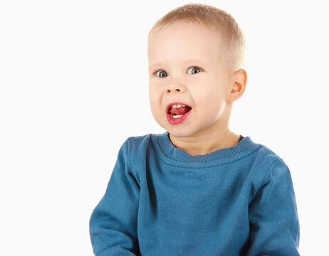 little boy child makes grimaces, happy childhood. soft focus