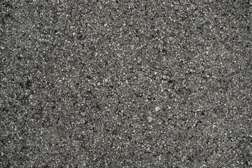 Texture of the road's gray asphalt as a background