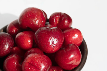 Cherries with water drops macro background. Top view.