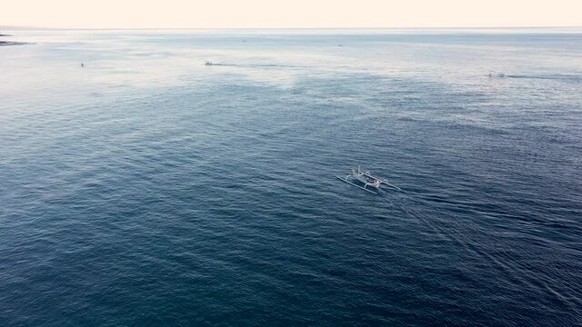 Traditional indonesian fishing boats in the ocean of Amed Bay, Bali, Indonesia