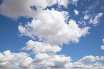 Blue sky with many white clouds