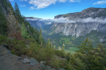 hiking the four mile trail in yosemite national park in california, usa