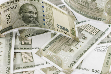 Indian currency notes of various denominations. Indian five hundred rupees note with other...
