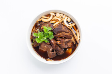 Bak kut teh is a pork rib dish cooked in broth popularly served in Malaysia and southern Thailand