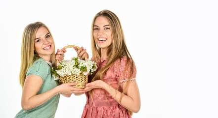 Happy womens day. Friendship and love. Women and flowers in basket. Rustic style girls gathering flowers together. Flowers shop. Natural fragrance. Girl carry flowers in basket. Floral shop