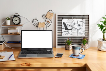 Wooden  office desk with blank computer with mockup and mug of coffee. Work at home with office accessories on a table. Business and technology. Creative desk.