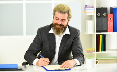 Great job. Businessman. businessman in office. employee during working day in office. working from home during a virus epidemic. Portrait of a handsome CEO. Busy mature man in office