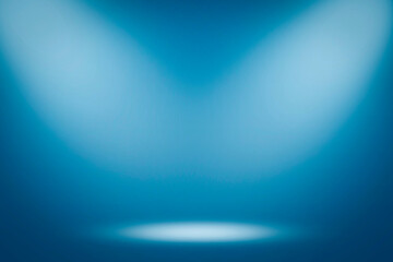 On a blue background, the spotlight shines down. Light source, artificial light.