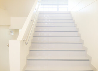 Fototapeta na wymiar White staircase steps interior design