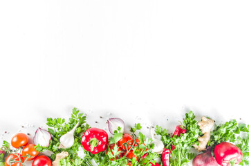Cooking background with fresh vegetables and herbs
