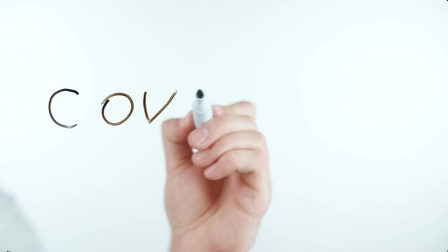 Video of man writes covid-19 word