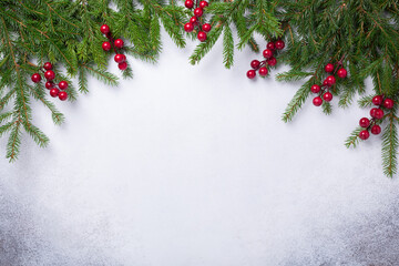Naklejka na ściany i meble Christmas stone background with fir tree branch. Top view. Copy space