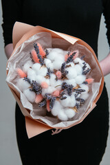 Bouquet of flowers in peach package