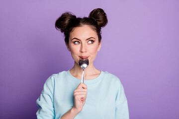 Close-up portrait of her she nice attractive dreamy curious girl licking spoon fantasizing healthy...
