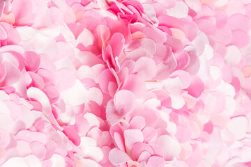 Obraz premium Passionate spring pink textile petals background