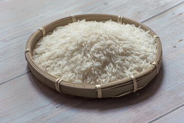 White rice in a round bamboo tray