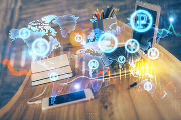 Financial chart drawing and table with computer on background. Multi exposure. Concept of international markets.