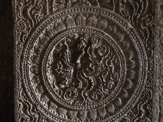 Wall sculpture on the wall of the ancient Ajanta Caves, Jalgaon, Maharashtra, Western India, India