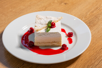 Cream pie served on white plate